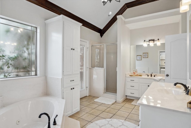 full bathroom with lofted ceiling, a sink, a shower stall, tile patterned flooring, and a whirlpool tub