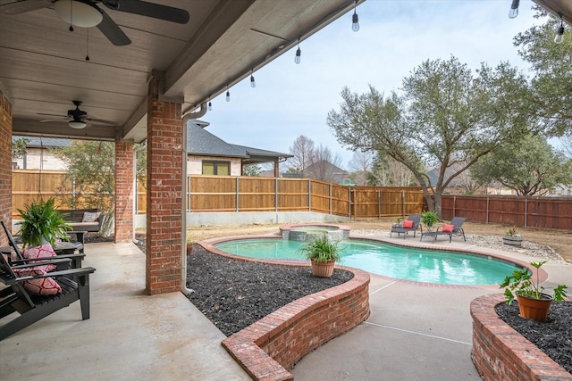 view of swimming pool featuring a fenced backyard, a patio, and ceiling fan