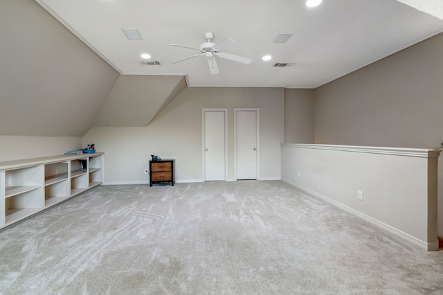 bonus room featuring carpet floors, baseboards, ceiling fan, and visible vents