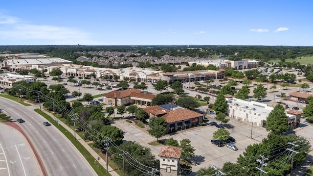 birds eye view of property with a residential view