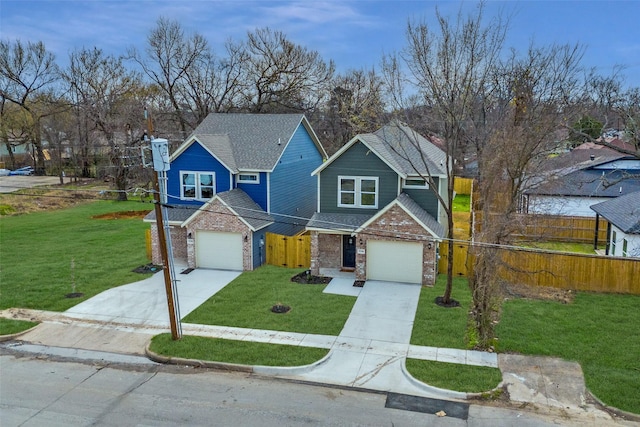 traditional-style house featuring a garage, brick siding, fence, concrete driveway, and a front lawn