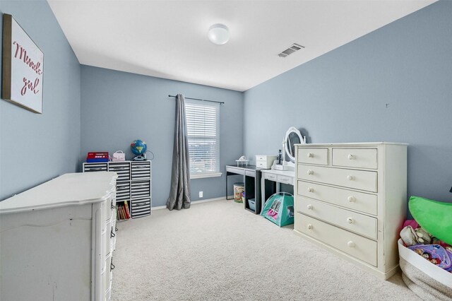 bedroom with carpet, visible vents, and baseboards