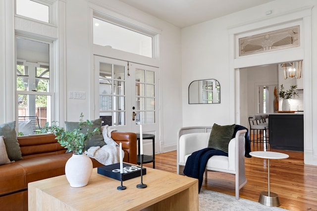 1502 W Virginia St, Mckinney, TX 75069 - living area featuring wood finished floors and french doors