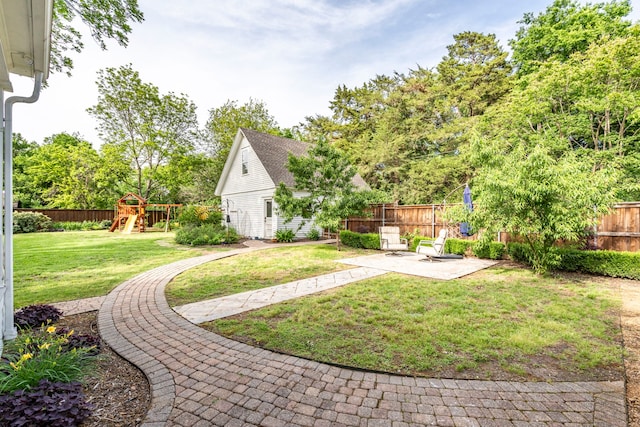 1502 W Virginia St, Mckinney, TX 75069 - view of yard with a patio and a playground