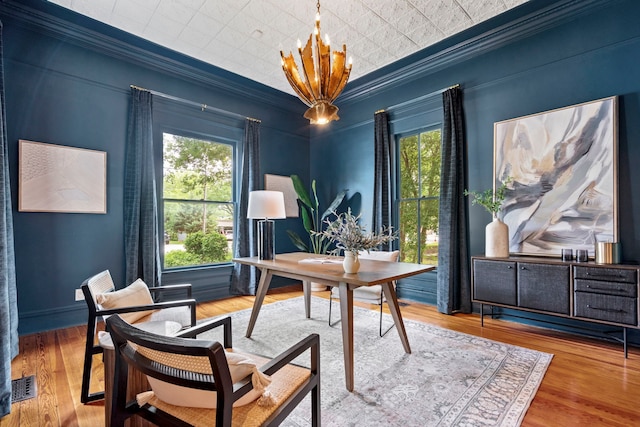 1502 W Virginia St, Mckinney, TX 75069 - office space with crown molding, plenty of natural light, wood finished floors, and a chandelier