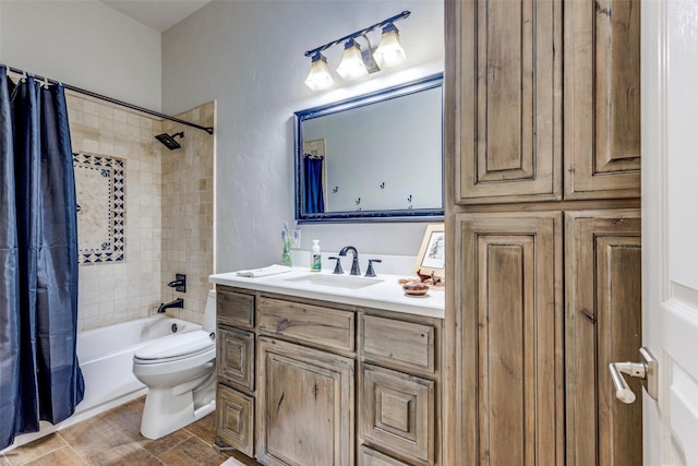 full bathroom featuring shower / tub combo, vanity, and toilet