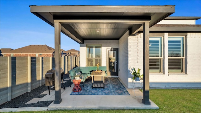 view of patio with grilling area and fence