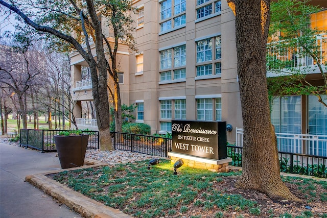 view of community featuring fence