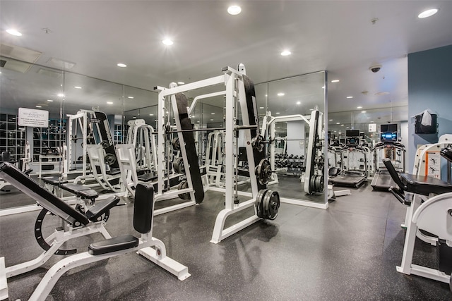 workout area featuring recessed lighting