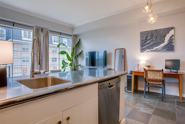 kitchen featuring ornamental molding, a sink, decorative light fixtures, white cabinetry, and dishwasher