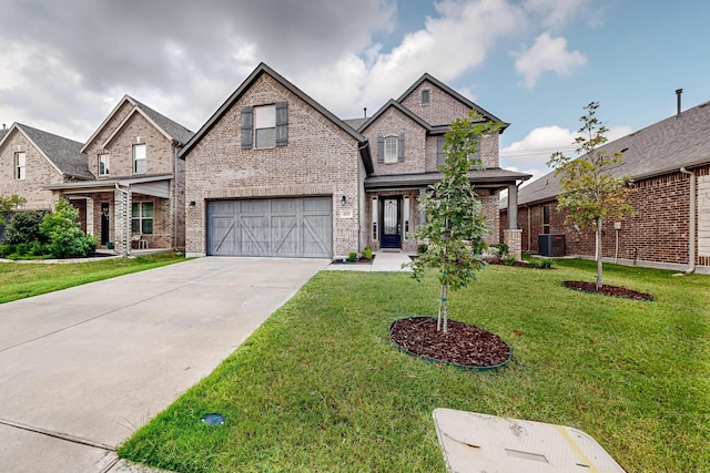 view of front of home featuring brick siding, concrete driveway, an attached garage, central AC, and a front lawn