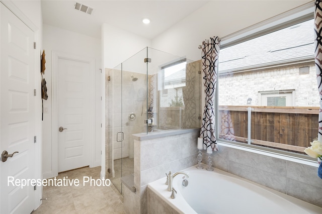 bathroom with a garden tub, a shower stall, visible vents, and recessed lighting