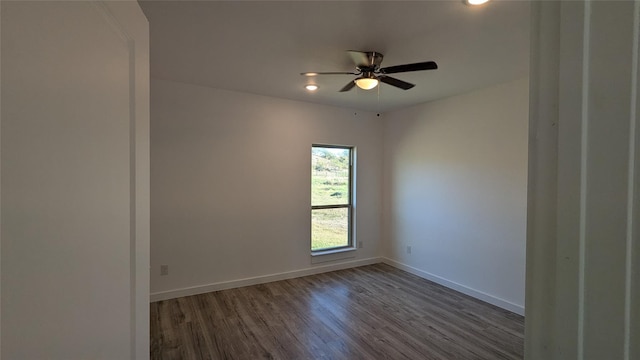 unfurnished room with dark wood-style floors, baseboards, a ceiling fan, and recessed lighting