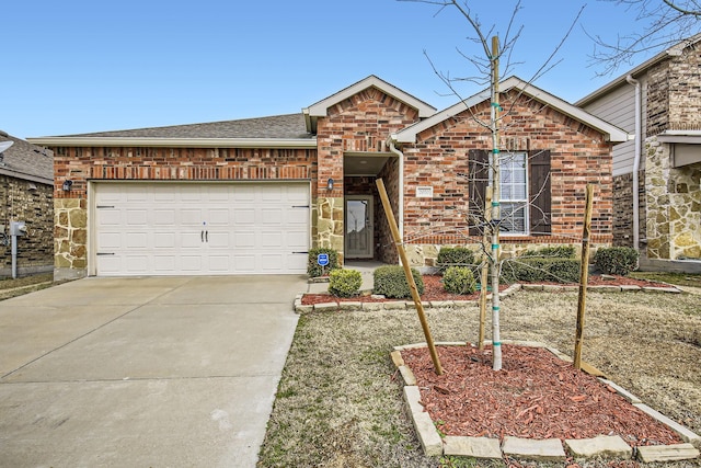 ranch-style home featuring driveway, a garage, a shingled roof, stone siding, and brick siding