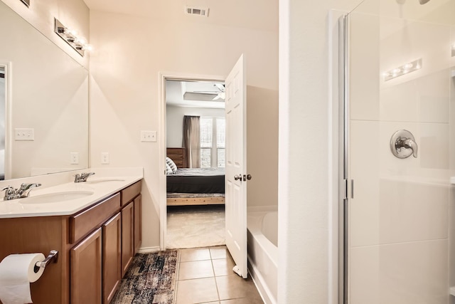 full bath featuring visible vents, a shower, ensuite bathroom, tile patterned flooring, and a sink