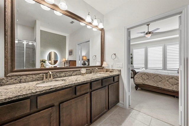 ensuite bathroom with a sink, double vanity, and ensuite bath