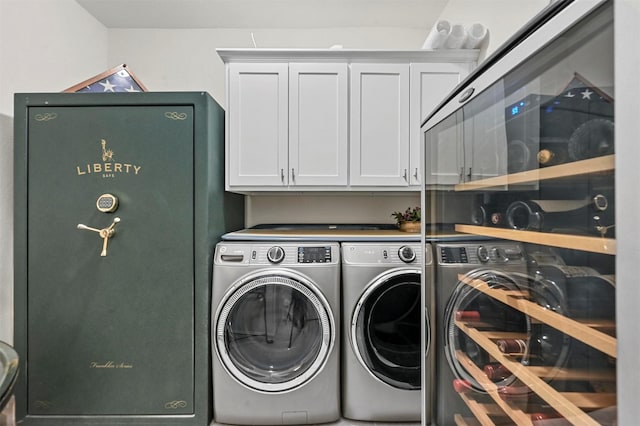 laundry room featuring cabinet space and washing machine and clothes dryer