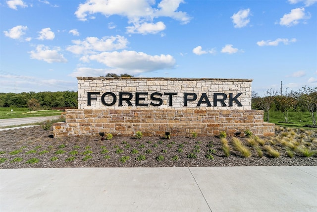 view of community sign