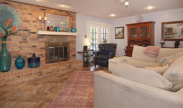 living room with marble finish floor and a fireplace