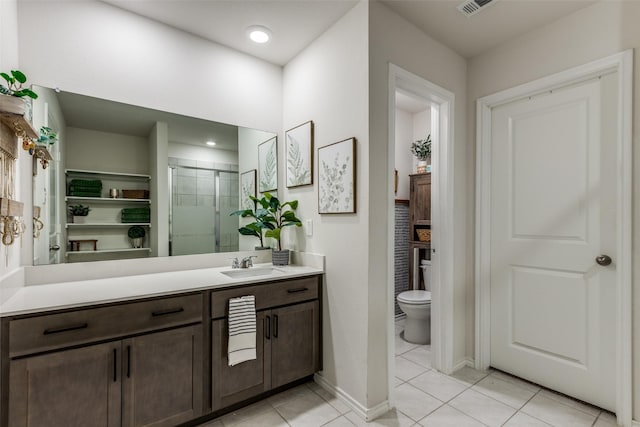 full bath featuring visible vents, toilet, tile patterned flooring, vanity, and a shower stall