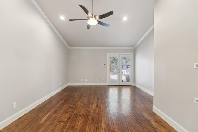 spare room featuring baseboards, ceiling fan, dark wood-type flooring, crown molding, and french doors