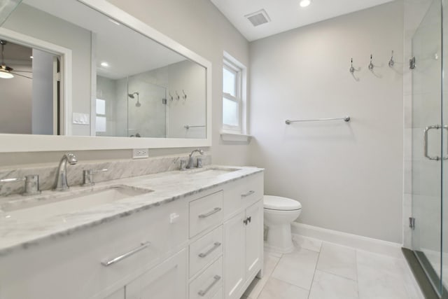 full bathroom with a stall shower, visible vents, a sink, and toilet