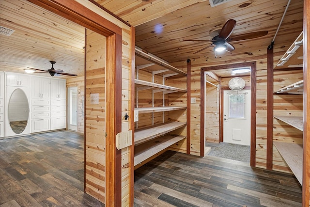 storage area featuring visible vents and a ceiling fan