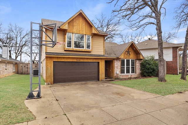 view of front of property with an attached garage, brick siding, fence, driveway, and a front yard