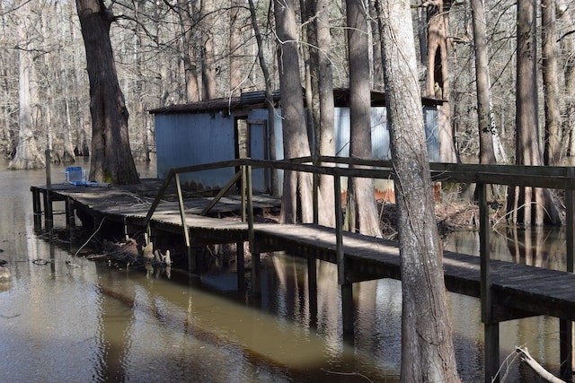 view of dock with a water view