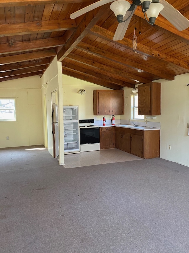 kitchen featuring vaulted ceiling with beams, range with electric stovetop, wood ceiling, and light countertops