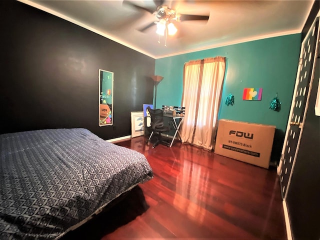 bedroom featuring ornamental molding, ceiling fan, and wood finished floors