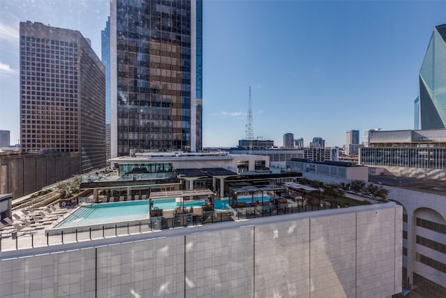 community pool featuring a city view