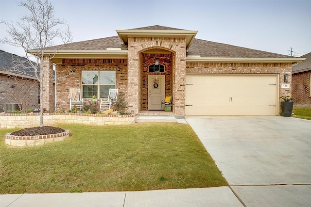 view of front of home with brick siding, cooling unit, an attached garage, concrete driveway, and roof with shingles