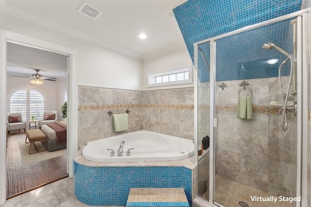 bathroom with visible vents, crown molding, a shower stall, and a garden tub