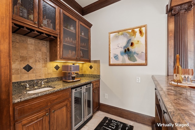 kitchen with light tile patterned floors, decorative backsplash, wine cooler, dark stone countertops, and a sink