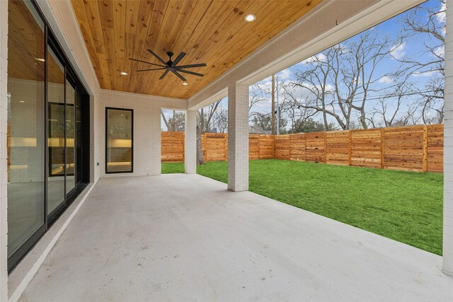 view of patio / terrace with a fenced backyard and a ceiling fan