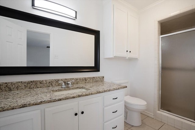 full bath featuring a stall shower, toilet, tile patterned flooring, crown molding, and vanity