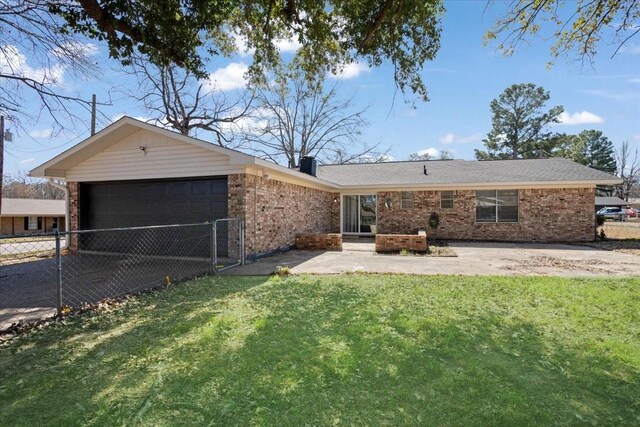 single story home featuring a front yard, fence, a patio, and brick siding