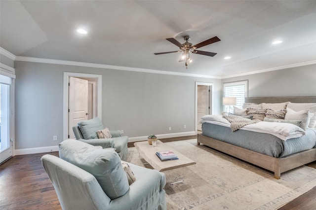 bedroom with crown molding, recessed lighting, wood finished floors, and baseboards