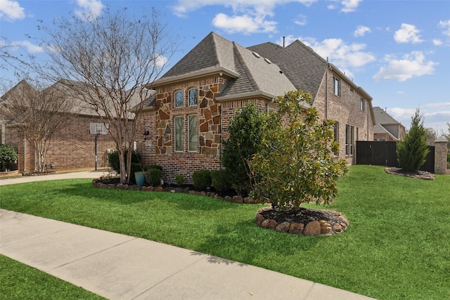 14109 Katiliz Pl, Frisco, TX 75035 - view of property exterior with brick siding and a shingled roof