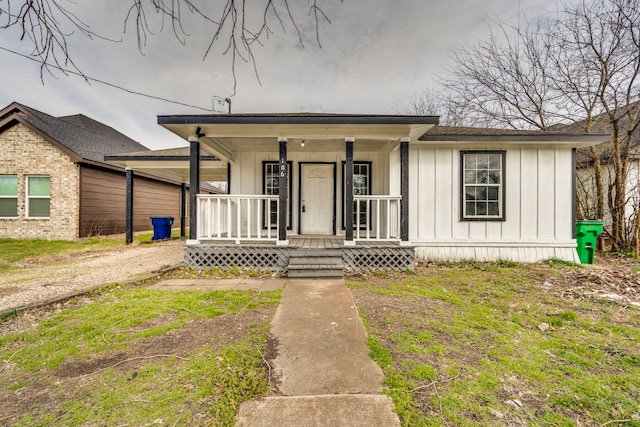 view of front of home featuring covered porch and board and batten siding