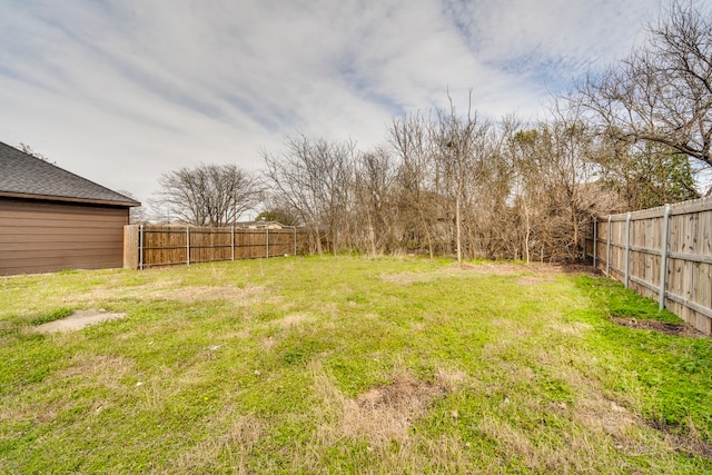 view of yard featuring a fenced backyard