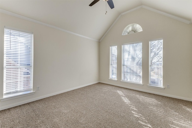 spare room with carpet floors, ceiling fan, ornamental molding, and lofted ceiling