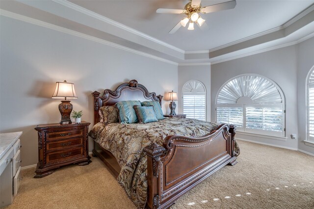 bedroom featuring baseboards, light carpet, and ornamental molding