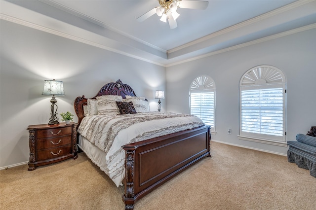 bedroom featuring light carpet, ceiling fan, baseboards, and ornamental molding