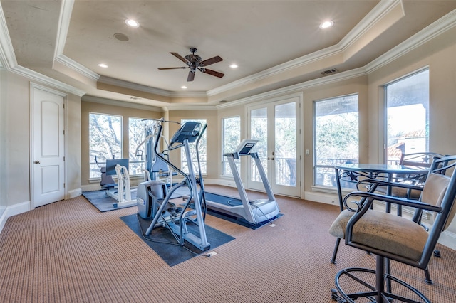 workout room featuring a ceiling fan, visible vents, a tray ceiling, recessed lighting, and light colored carpet