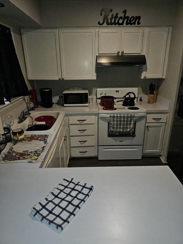 kitchen featuring white cabinets, light countertops, white electric range, under cabinet range hood, and a sink