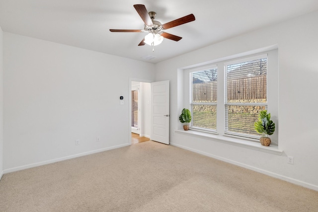 1536 Wolfberry Ln, Northlake, TX 76226 - spare room featuring light colored carpet, a ceiling fan, and baseboards