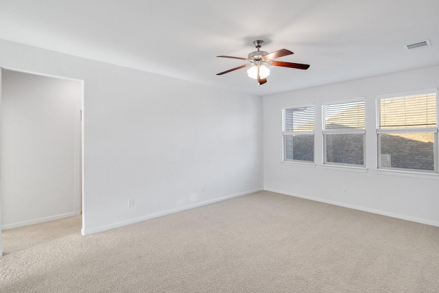 1536 Wolfberry Ln, Northlake, TX 76226 - spare room with light colored carpet, ceiling fan, and baseboards