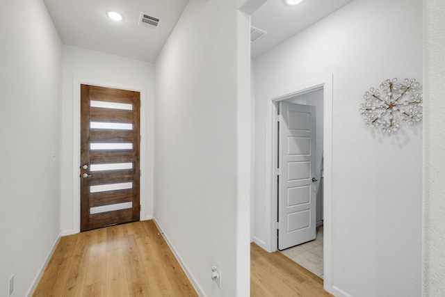 1536 Wolfberry Ln, Northlake, TX 76226 - doorway with light wood-style flooring and baseboards
